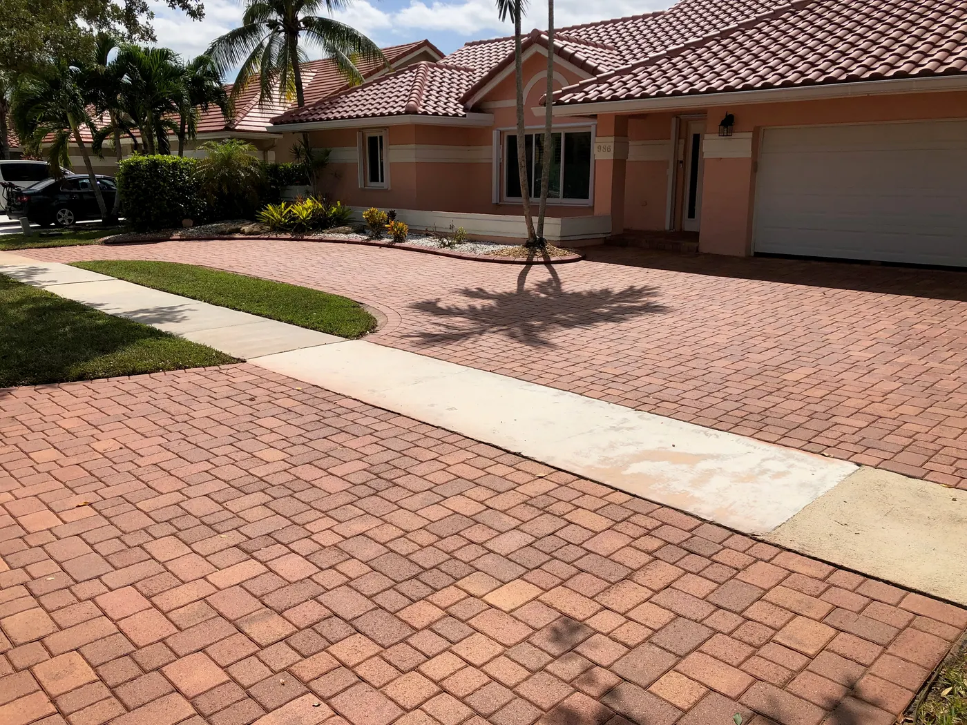 Red brick paver driveway with color restored by SignaSeal