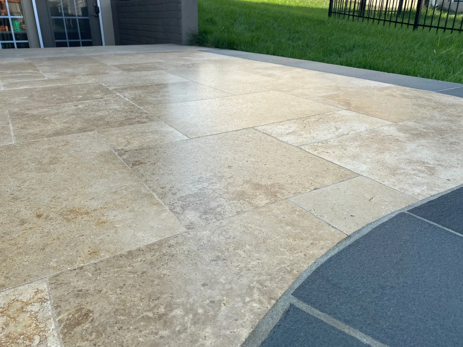 Travertine pool deck surface — non-slip treatment in Miami, FL